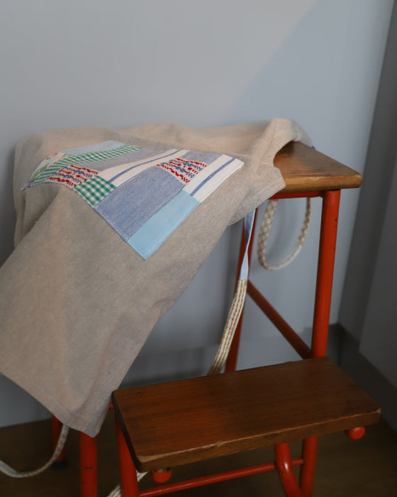 Patchwork børneforklæde